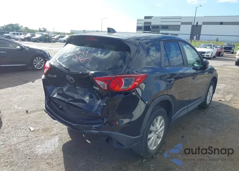 2013 Mazda Cx-5 Touring z USA, uszkodzony, nr VIN JM3KE2CE9D0148142